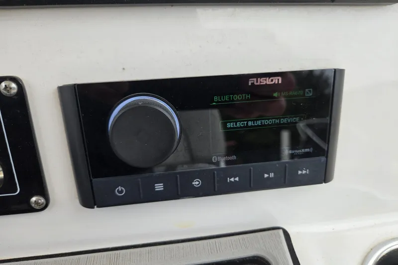Slide: The Image of Fusion Bluetooth stereo system on 2023 Sea Fox 228 Commander boat dashboard. - 20
