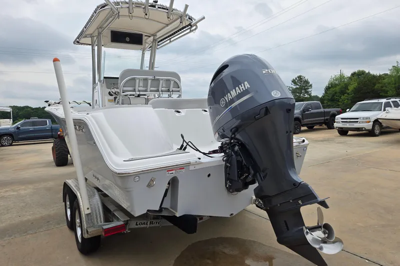 Slide: The Image of 2023 Sea Fox 228 Commander boat with Yamaha engine on trailer. - 23
