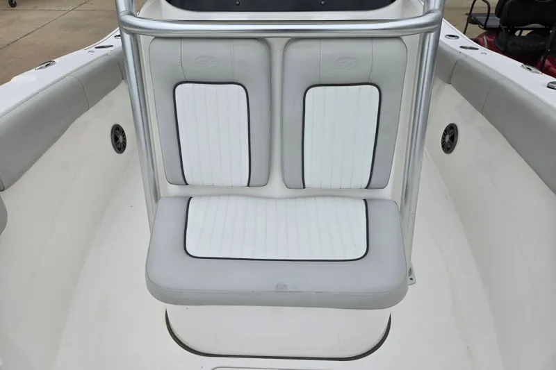 Slide: The Image of 2023 Sea Fox 228 Commander boat seating with white and gray upholstery. - 7