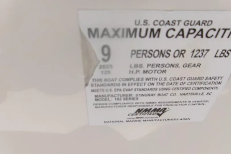 Slide: The Image of 2018 Stingray 182 SC boat capacity label, U.S. Coast Guard certified for 9 persons or 1237 lbs. - 10