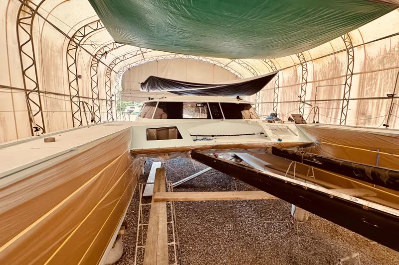 Slide: The Image of Catamaran under construction in a covered workshop, Alibi 54 model, 2011. - 18