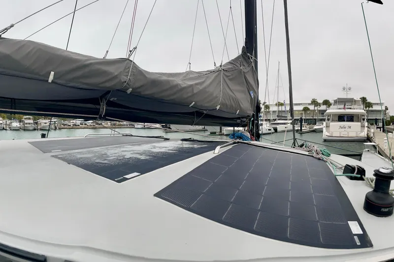 Slide: The Image of Sailboat with solar panels docked at marina, Alibi 54 model, 2011. - 27