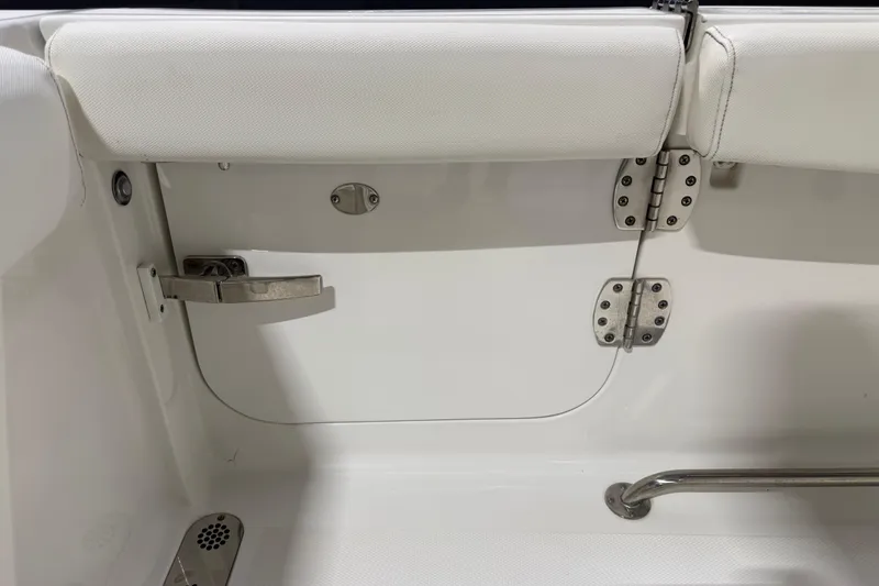 Slide: The Image of Interior view of a 2016 Sea Hunt Gamefish 25 boat, featuring seating and hardware. - 5