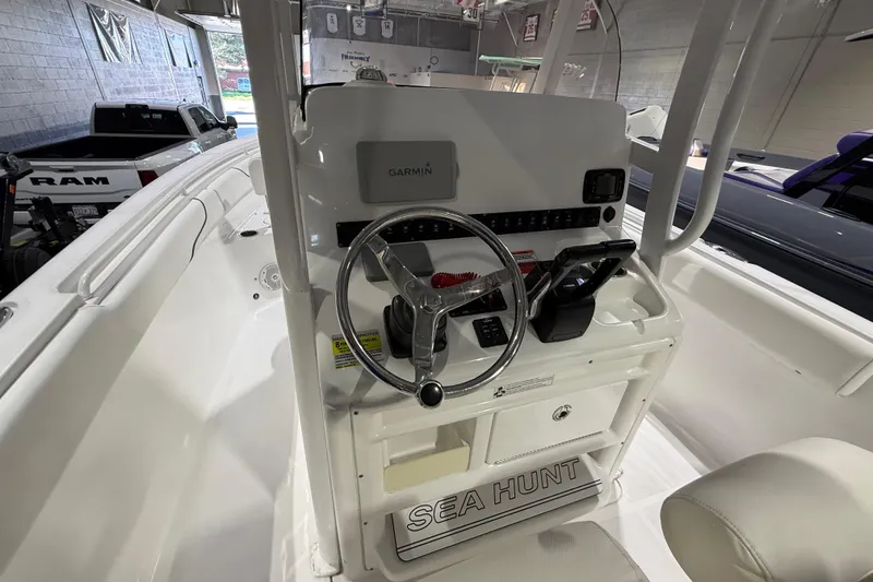 Slide: The Image of 2016 Sea Hunt Gamefish 25 boat console with Garmin navigation system. - 8
