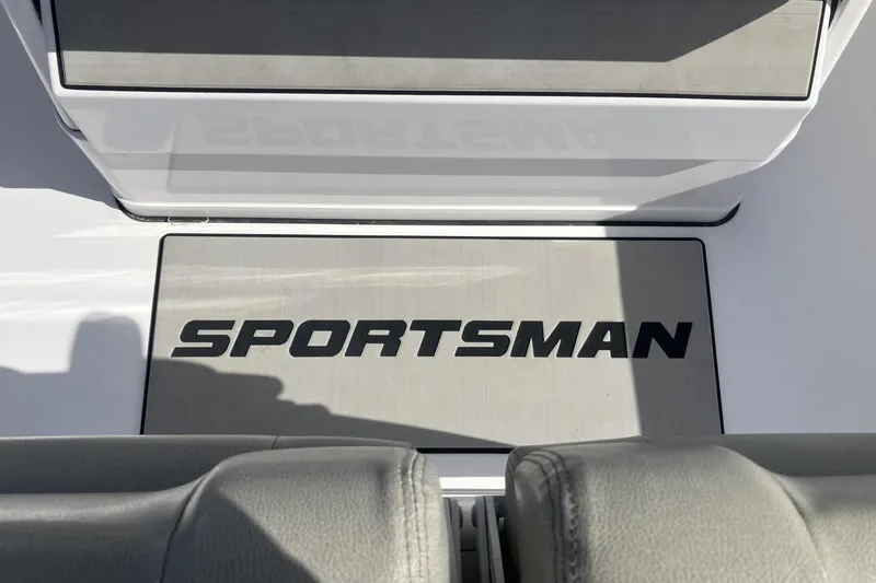 Slide: The Image of 2024 Sportsman Heritage 231 Center Console boat interior with logo. - 15