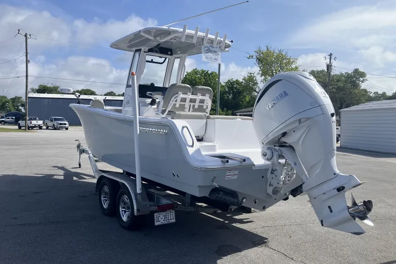 Slide: The Image of 2024 Sportsman Heritage 231 Center Console boat with Yamaha outboard motor on trailer. - 5