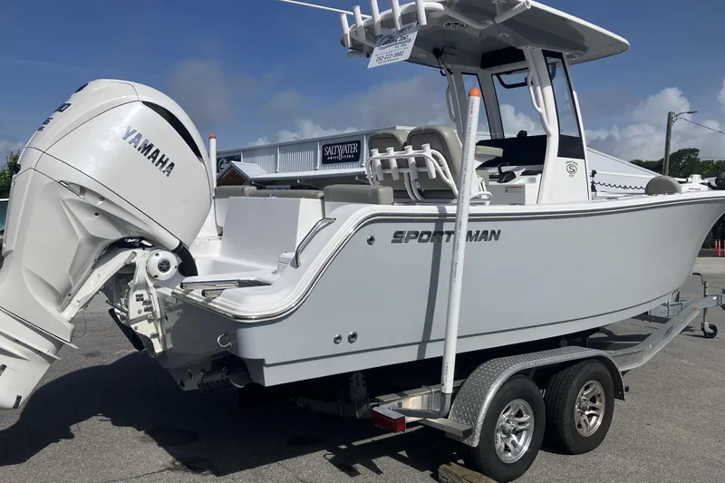 Slide: The Image of 2024 Sportsman Heritage 231 Center Console boat with Yamaha engine on trailer. - 6