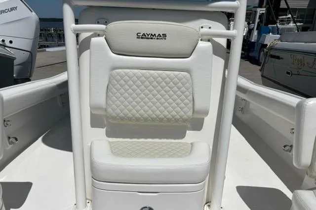 Slide: The Image of 2021 Caymas 26 HB boat seat with quilted white upholstery. - 14