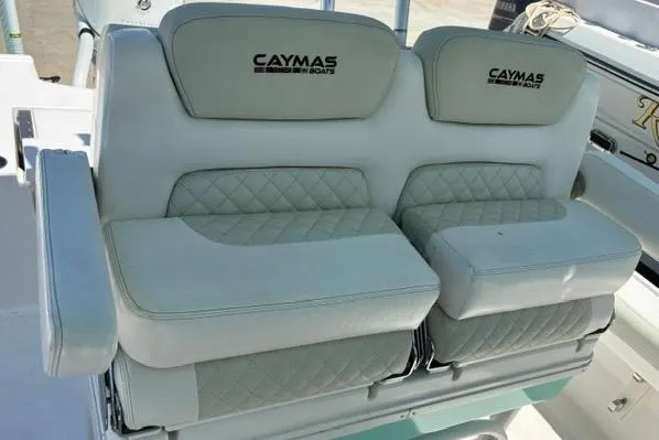 Slide: The Image of Caymas 26 HB 2021 boat seats with quilted design and armrests. - 8