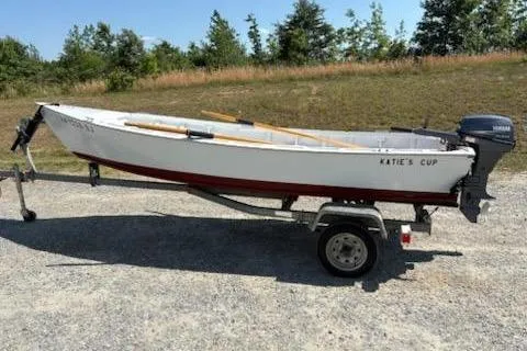 The Image of Homebuilt 2006 V-HULL boat on trailer with outboard motor, named "Katie's Cup." - 1