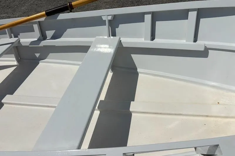 Slide: The Image of Interior of a 2006 Homebuilt V-HULL boat with wooden oar. - 5