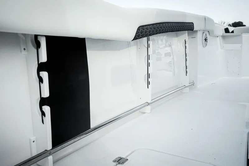 Slide: The Image of 2026 Tidewater 282 CC Adventure boat interior, featuring sleek white design and modern detailing. - 14
