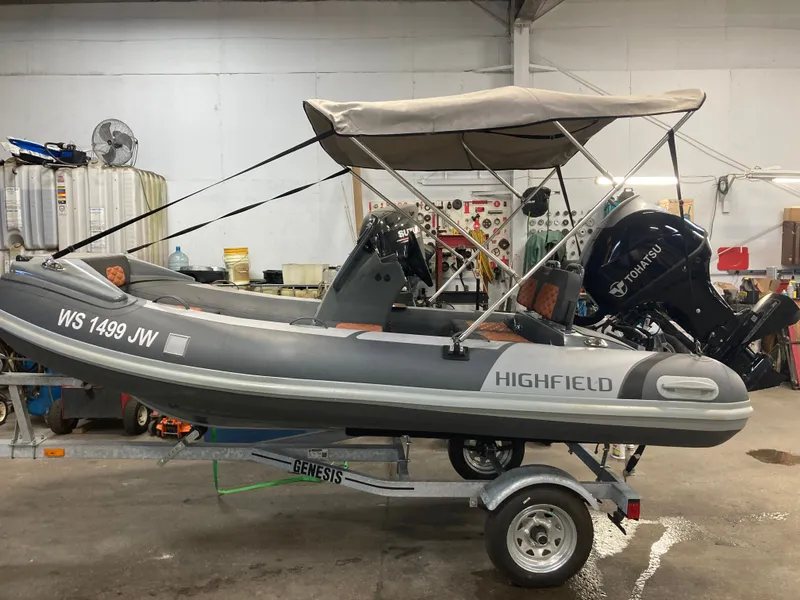 The Image of 2023 Highfield Sport 360 inflatable boat in workshop on trailer. - 0