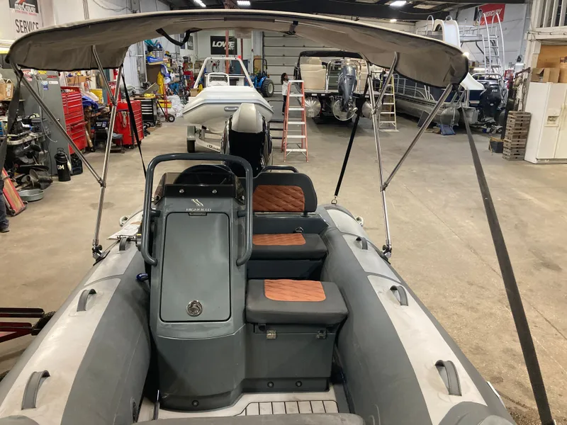 Slide: The Image of 2023 Highfield Sport 360 boat in workshop with Bimini top. - 5