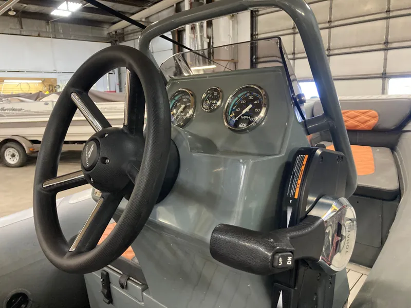 Slide: The Image of Steering console of the 2023 Highfield Sport 360 boat. - 9