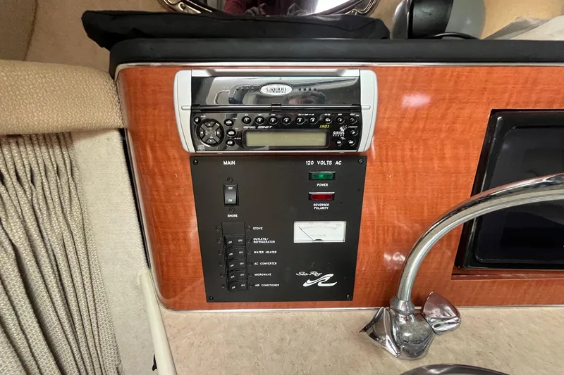 Slide: The Image of Control panel of a 2004 Sea Ray 240 Sundancer boat with stereo system. - 22