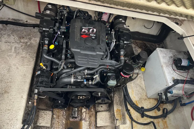 Slide: The Image of Engine compartment of a 2004 Sea Ray 240 Sundancer with MerCruiser 5.0 MPI engine. - 35