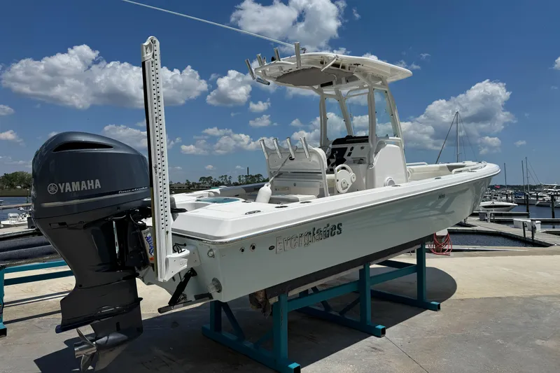 The Image of 2017 Everglades 243 Center Console boat with Yamaha engine at marina. - 1