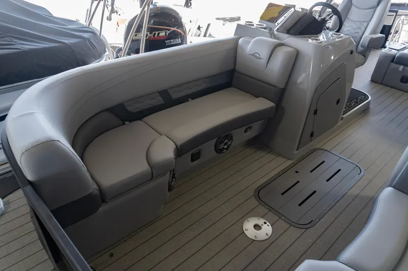 Slide: The Image of Luxurious seating area on 2026 SunCatcher Fusion 324SL boat, featuring sleek design and modern amenities. - 12