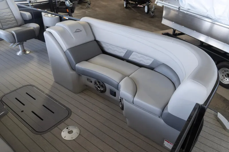 Slide: The Image of Luxurious seating on 2026 SunCatcher Fusion 324SL pontoon boat, featuring sleek gray upholstery. - 13