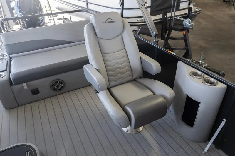 Slide: The Image of Luxurious seating on 2026 SunCatcher Fusion 324SL boat, featuring cup holders and modern design. - 16