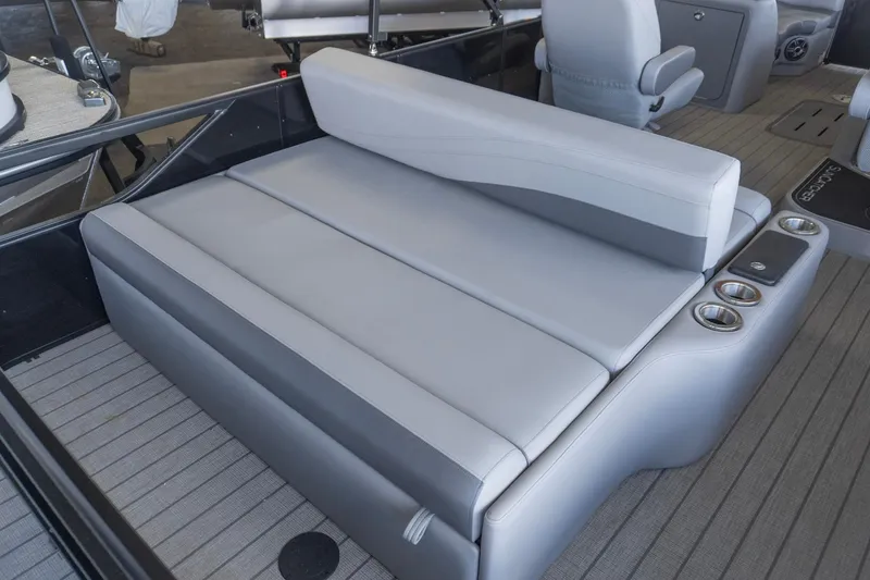 Slide: The Image of Luxurious seating on 2026 SunCatcher Fusion 324SL boat with cup holders and sleek design. - 2
