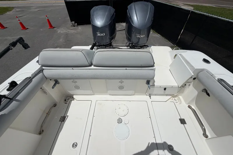 Slide: The Image of 2011 Jefferson Marlago FS35 boat interior with twin 300 horsepower engines. - 86