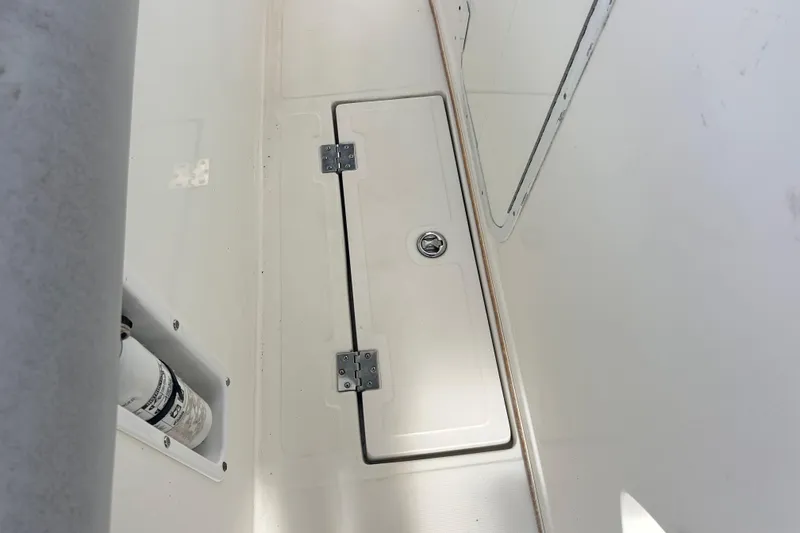 Slide: The Image of Hatch on Jefferson Marlargo FS35 boat deck, 2011 model, with visible hinges and latch. - 28