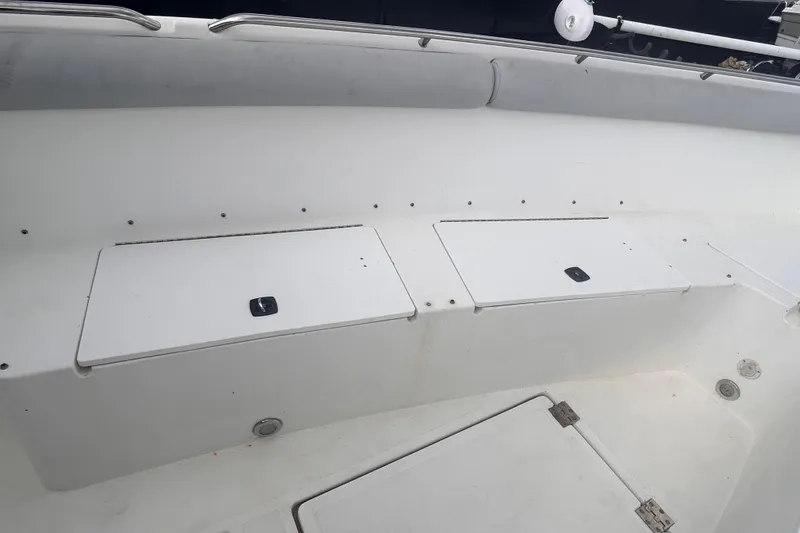 Slide: The Image of Interior view of a 2011 Jefferson Marlargo FS35 boat, featuring storage compartments. - 36