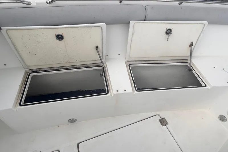 Slide: The Image of Open storage compartments on a 2011 Jefferson Marlargo FS35 boat deck. - 37
