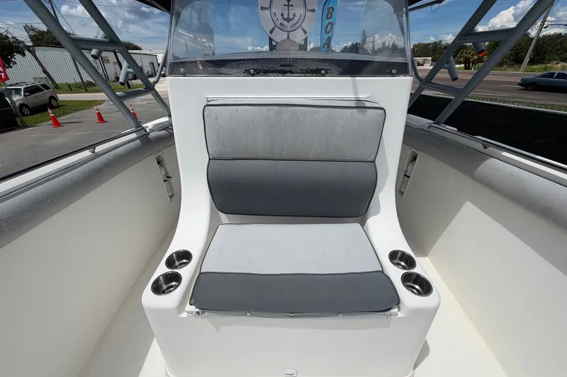 Slide: The Image of 2011 Jefferson Marlago FS35 boat interior with cushioned seating and cup holders. - 73
