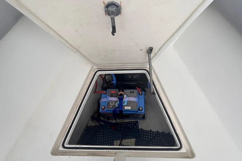 Slide: The Image of Battery compartment of a 2011 Jefferson Marlago FS35 boat. - 39