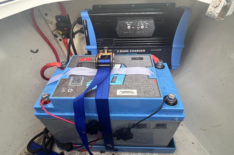 Slide: The Image of Blue battery with charger in a Jefferson Marlargo FS35, 2011 model boat. - 40