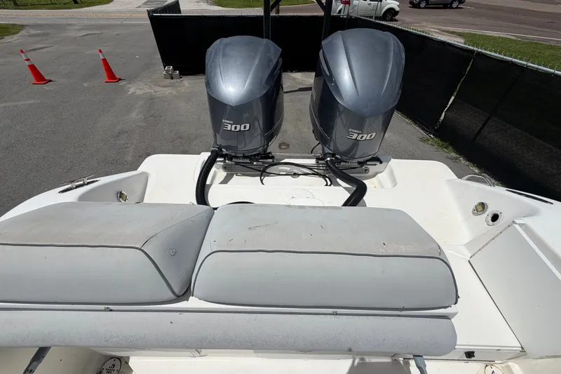 Slide: The Image of 2011 Jefferson Marlago FS35 boat with twin Yamaha 300 engines, parked on pavement. - 90