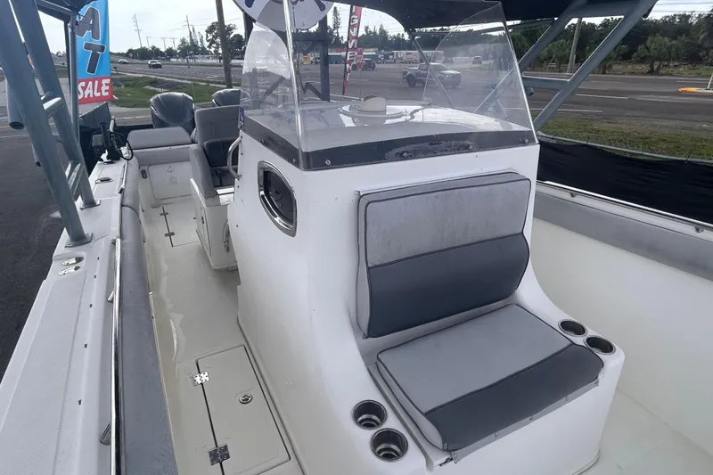 Slide: The Image of 2011 Jefferson Marlargo FS35 boat interior with seating and console, displayed for sale. - 46