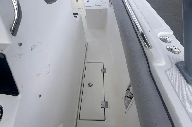 Slide: The Image of Interior view of a 2011 Jefferson Marlargo FS35 boat, featuring a clean white deck. - 47