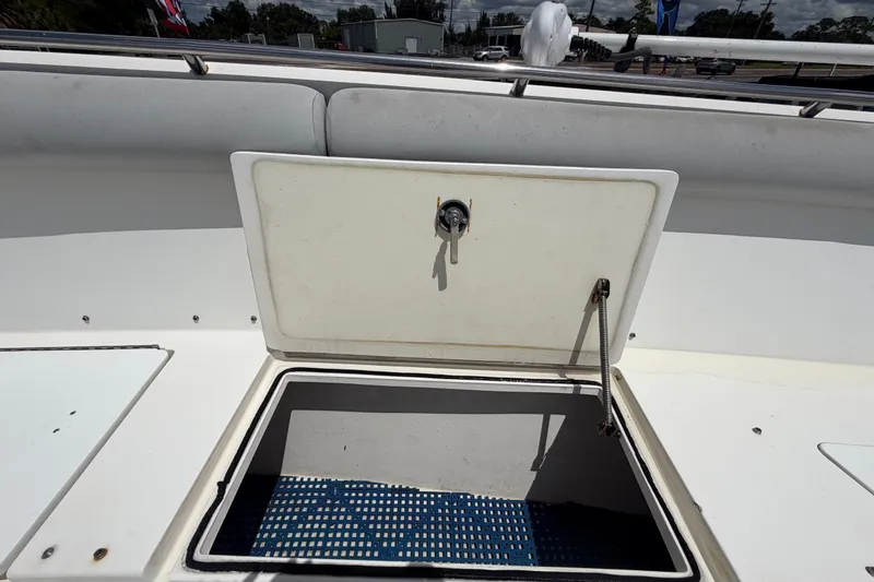 Slide: The Image of Open storage compartment on a 2011 Jefferson Marlago FS35 boat deck. - 60