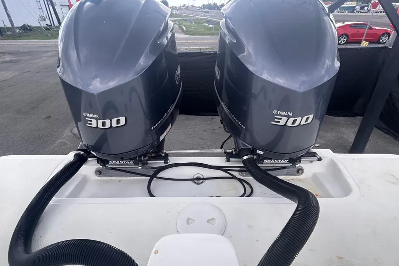 Slide: The Image of Twin Yamaha 300 outboard motors on a Jefferson Marlargo FS35, 2011 model. - 56