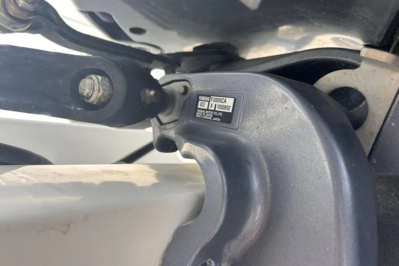 Slide: The Image of Close-up of a Jefferson Marlargo FS35 2011 engine component with visible label details. - 58