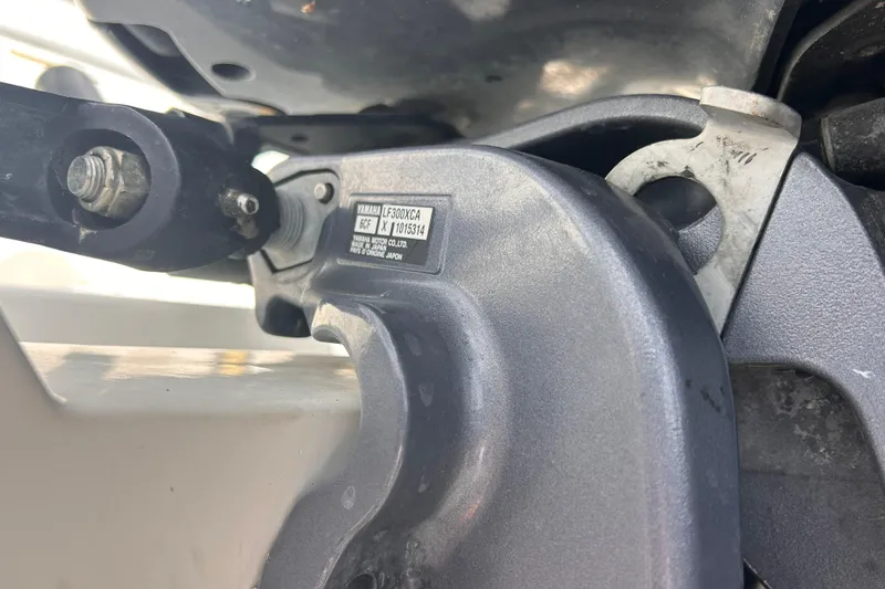 Slide: The Image of Close-up of a Yamaha LF300XCA engine part on a Jefferson Marlargo FS35, 2011 model. - 59
