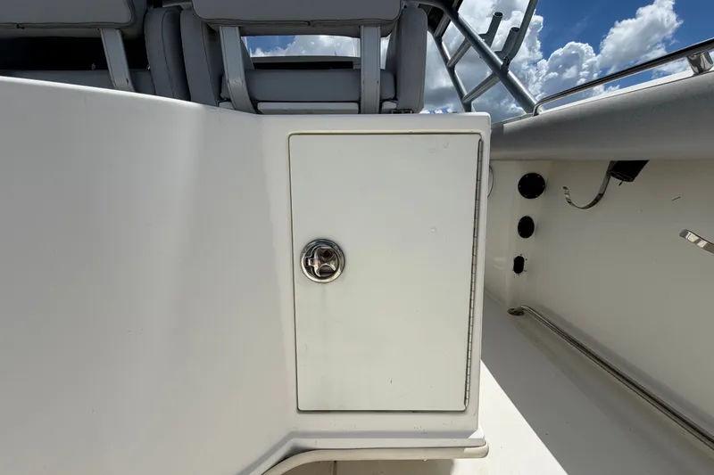 Slide: The Image of 2011 Jefferson Marlago FS35 boat interior with storage compartment and seating. - 24