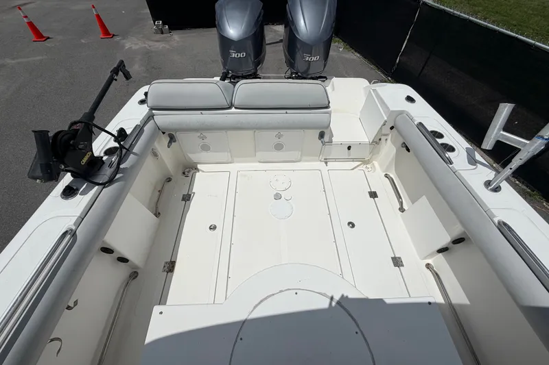 Slide: The Image of 2011 Jefferson Marlago FS35 boat interior with twin engines and spacious seating area. - 83