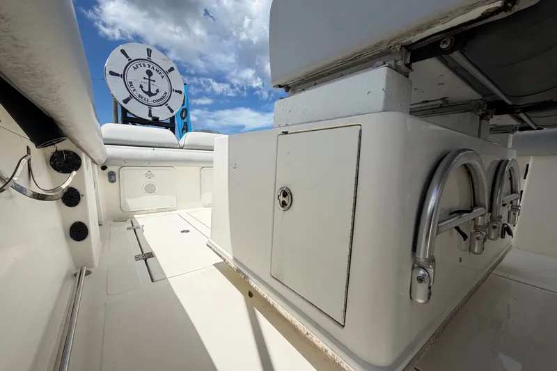Slide: The Image of Interior view of a 2011 Jefferson Marlago FS35 boat under a partly cloudy sky. - 79