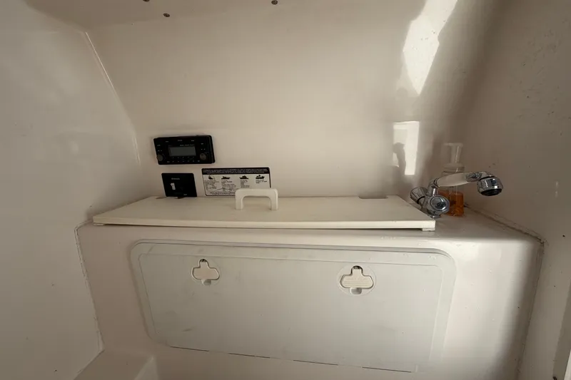 Slide: The Image of Interior of a 2011 Jefferson Marlago FS35 boat with sink and control panel. - 50