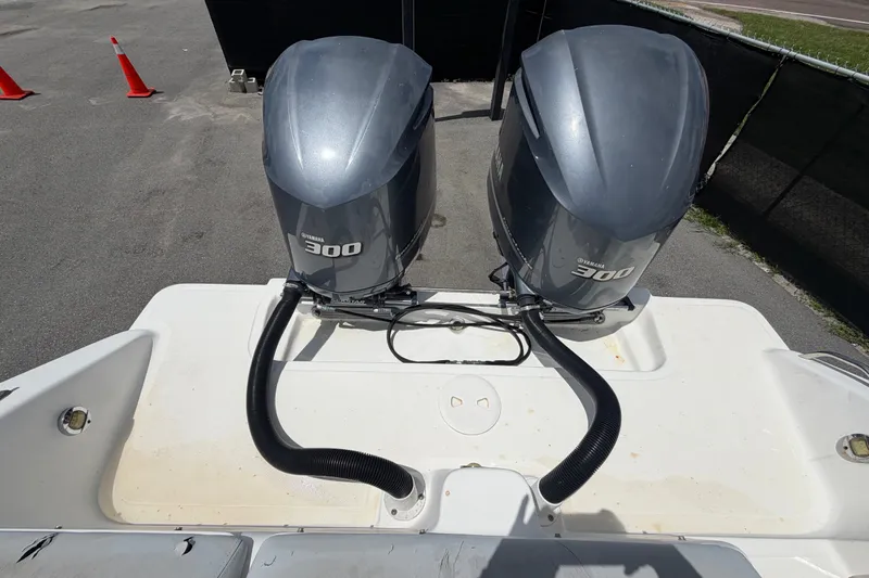 Slide: The Image of Twin Yamaha 300 engines on a 2011 Jefferson Marlago FS35 boat. - 91