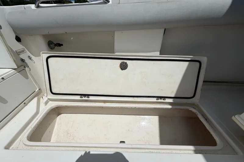 Slide: The Image of Open storage compartment on a 2011 Jefferson Marlago FS35 boat. - 20