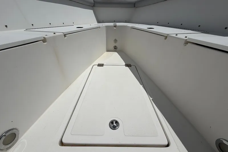 Slide: The Image of Interior view of 2011 Jefferson Marlago FS35 boat, featuring spacious storage compartments. - 55
