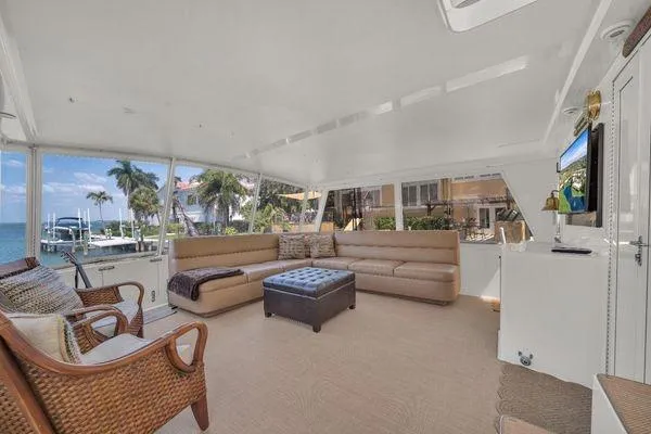 Slide: The Image of Luxurious 1993 Viking Convertible yacht interior with spacious seating and ocean view. - 46
