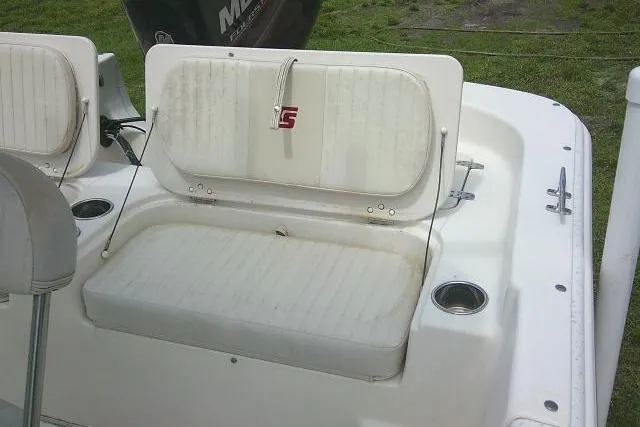 Slide: The Image of 2013 Carolina Skiff 198 DLV boat seating area with cup holders. - 16