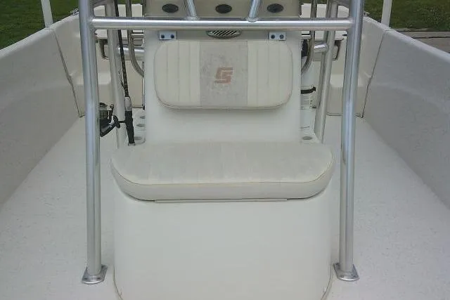 Slide: The Image of 2013 Carolina Skiff 198 DLV boat interior with seating and console. - 9